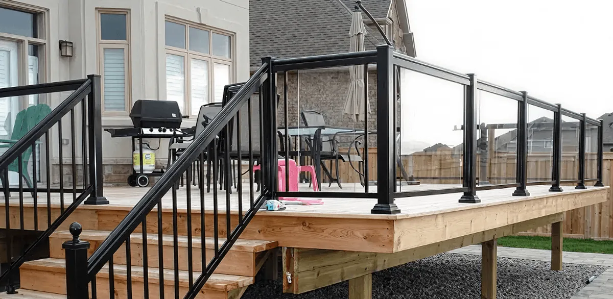 Handrail installation on a deck staircase for safety and code compliance in Tacoma, WA